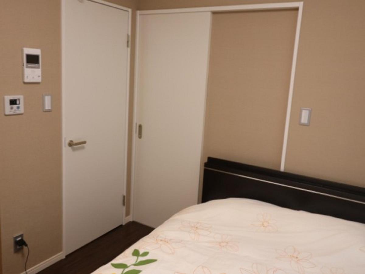 Mr. Kinjo In Makishi Aparthotel Naha Phòng bức ảnh
