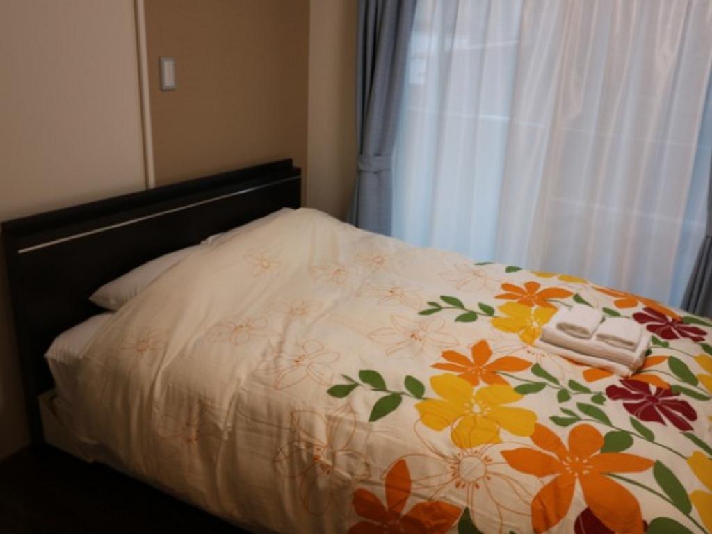 Mr. Kinjo In Makishi Aparthotel Naha Phòng bức ảnh